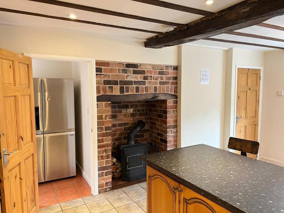 Upper Caerfaelog Farmhouse Llanbister ภายนอก รูปภาพ